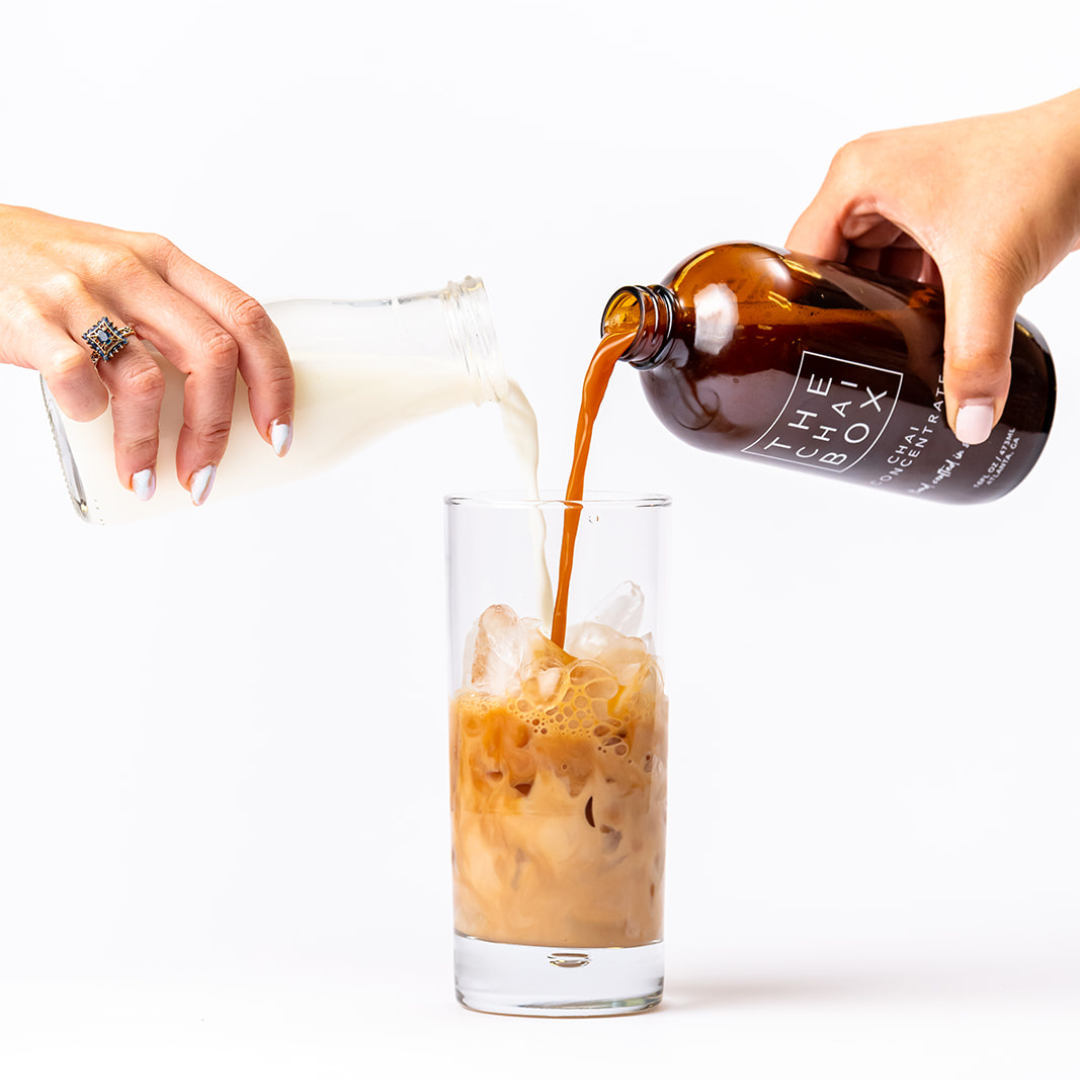 Milk being with over chai concentrate cubes. The chai box concentrate is a convenient way to make iced chai. Ethical and Sustainable chai.