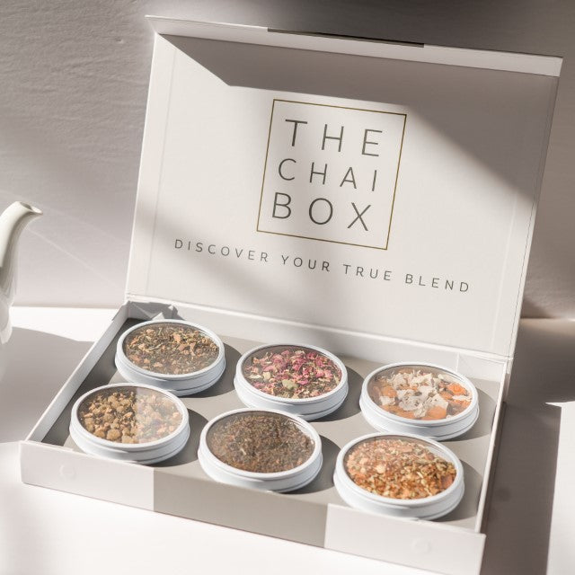Chai Sampler Gift Set box open.  Set includes All Chai'd Up, Sweet Monsoon, Hill Station, Punjaban Party, True blend and All Chai'd Up Rooibos loose leaf tea flavors.