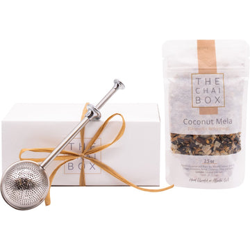 The Chai Box Coconut Mela Gift Set. Includes a bag of Coconut Mela loose leaf tea blend and a tea steeper.