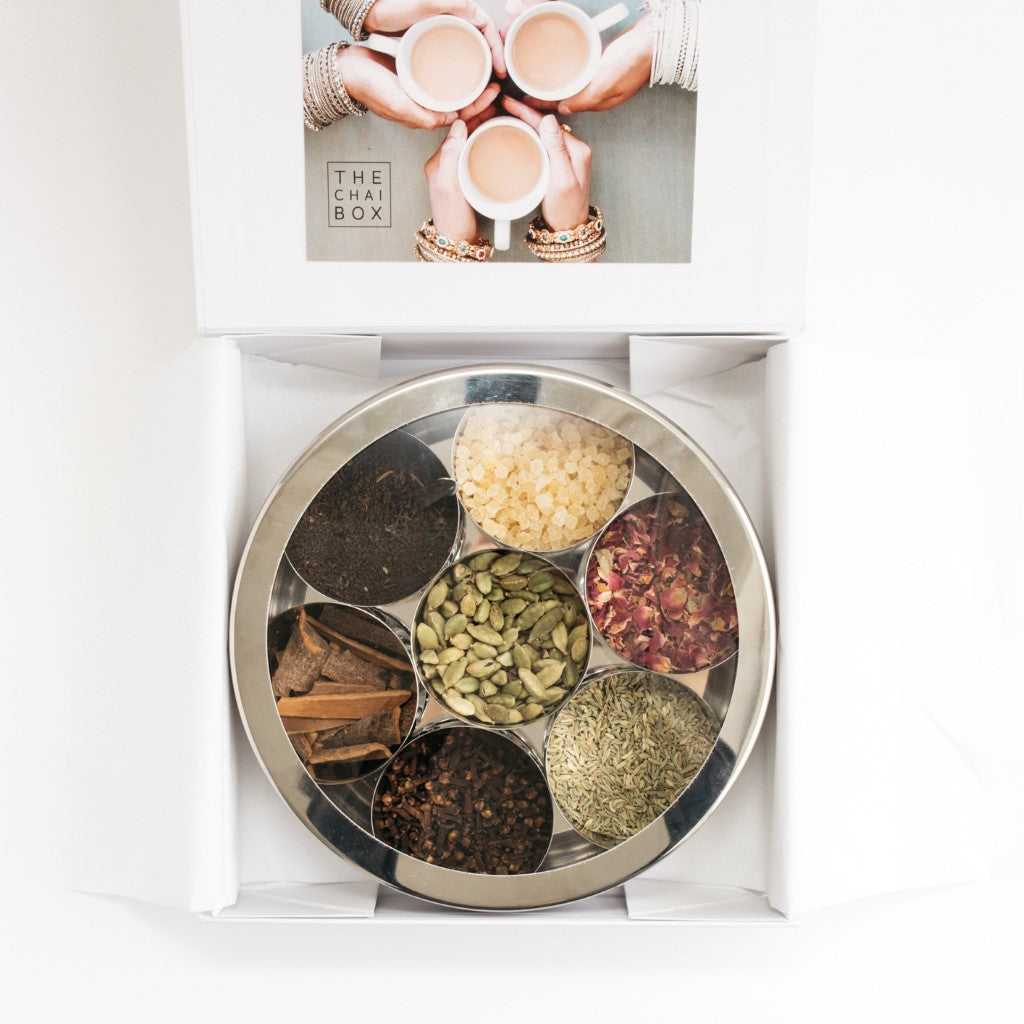 The Cahi Box Gift set has an array of spices that include: candied ginger, cloves, cinnamon bark, fennel seeds, cardamon and cloves.