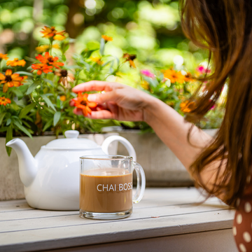 Chai Boss Mug filled with masala chai. The perfect way to enjoy a cup of The Chai Box authentic loose leaf tea blends.