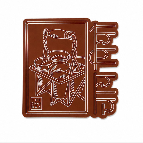 Illustrated sticker with four cups of chai and the pharse written in Hindi Chai Piyo (meaning drink chai)
