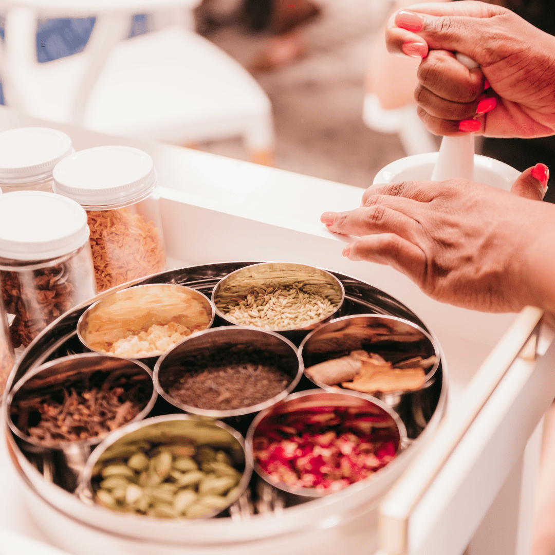True Blend Loose Leaf tea and authentic chai spices on a traditional Indian tea box. 