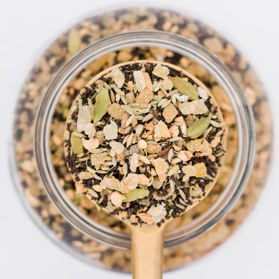 Scoop of Punjaban Party loose leaf tea blend. Made with black tea, candied ginger, fennel, and cardamom