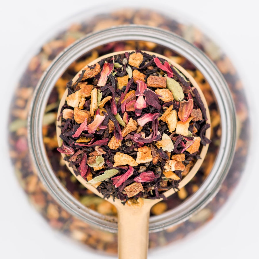 A scoop of Jaipur Summer chai. Made with black tea, hibiscus, oranges and cardamon. 