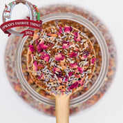 Scoop of Lavender Night decaf loose leaf tea blend. Oprah's Favorite Things 2021. Made with rooibos leaves, lavender, cardamom and rose petals 