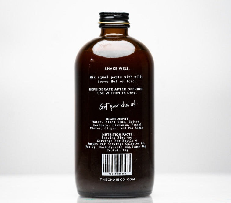 Back of Chai Concentrate bottle. Made with black tea, water, spices, cardamom, cinnamon, fennel, ginger, cloves and raw sugar.