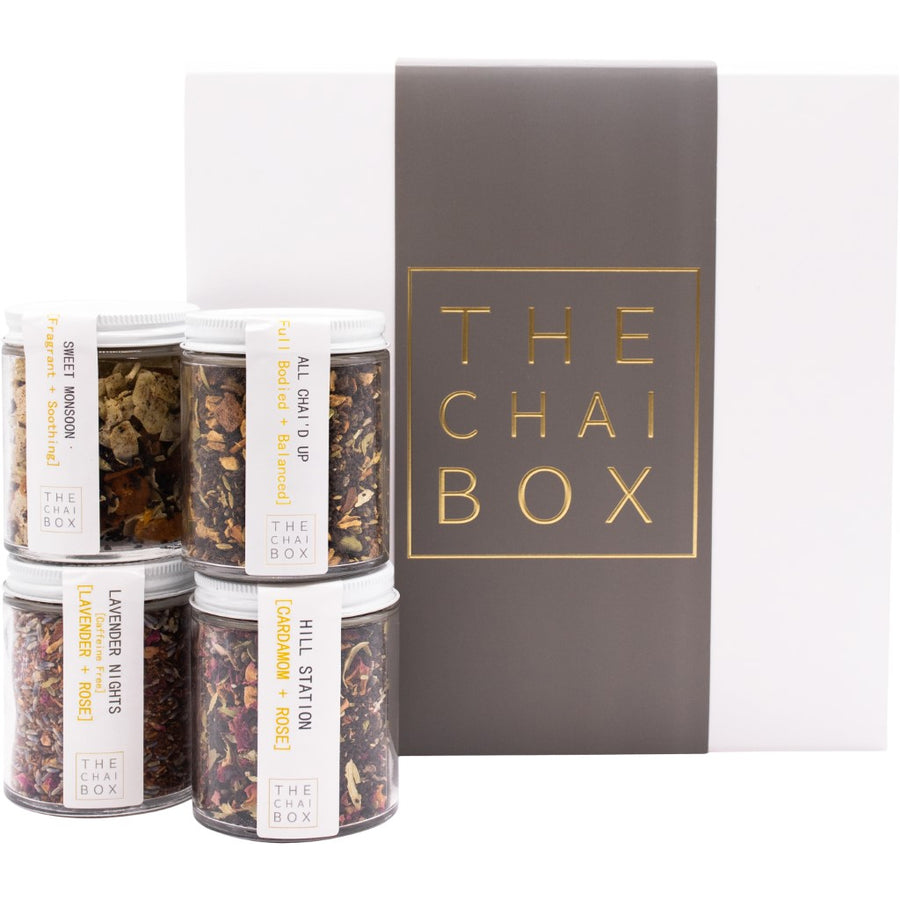 Box of Chai Lover's Gift Set and 4 chai blends flavors packaged on a glass jar.  Shop Online. 